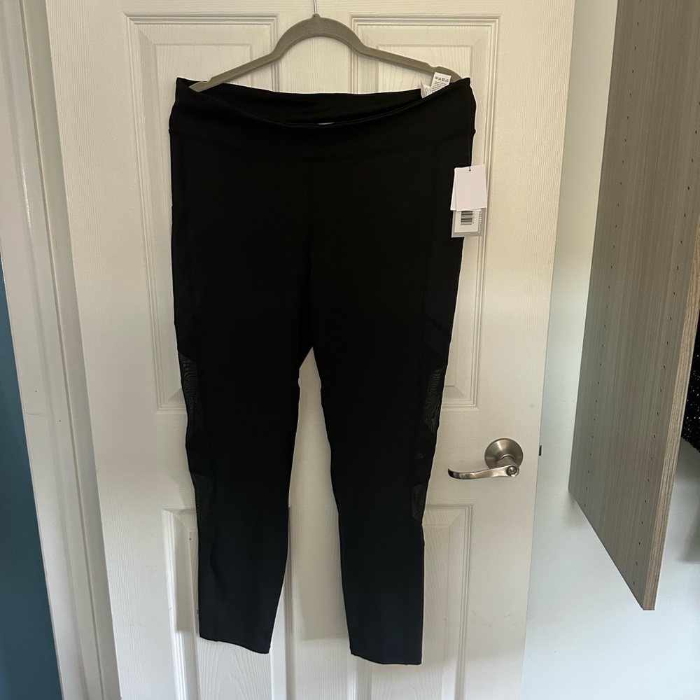 New black super soft leggings with see-through sides.